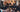 Corporate_team_building_leathercraft_workshop_in_Singapore_with_employees_collaborating_on_handmade_leather_items